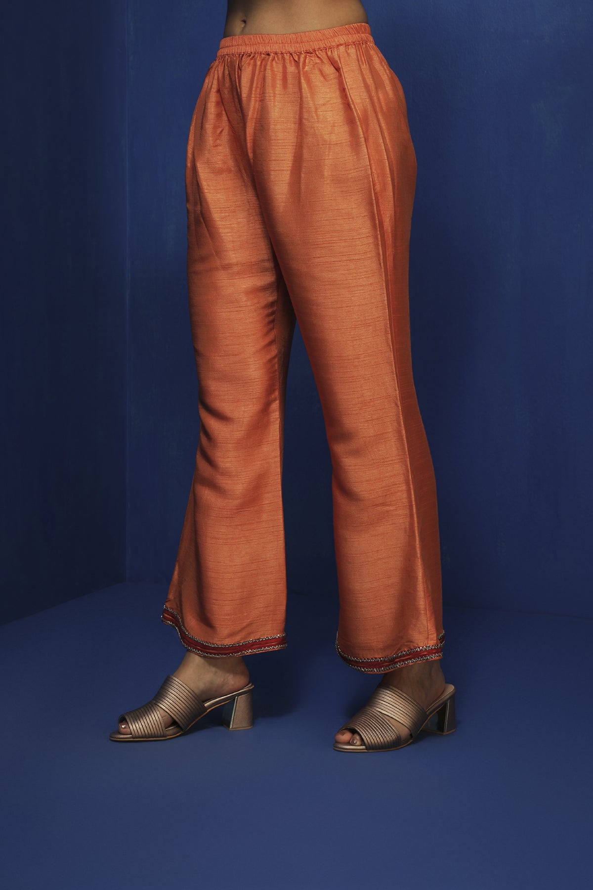 Orange bell bottom pants
