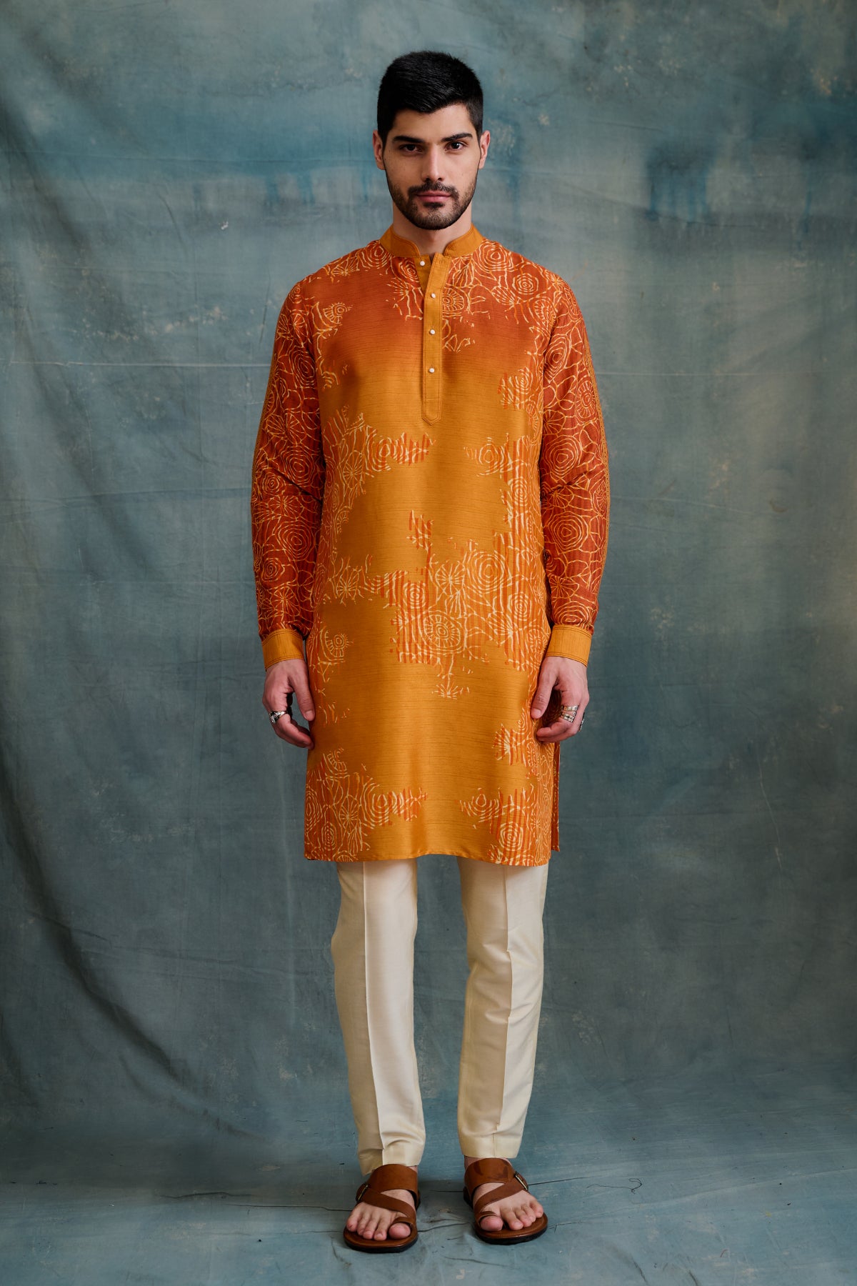 Orange-shaded tussar kurta asymmetric block printed