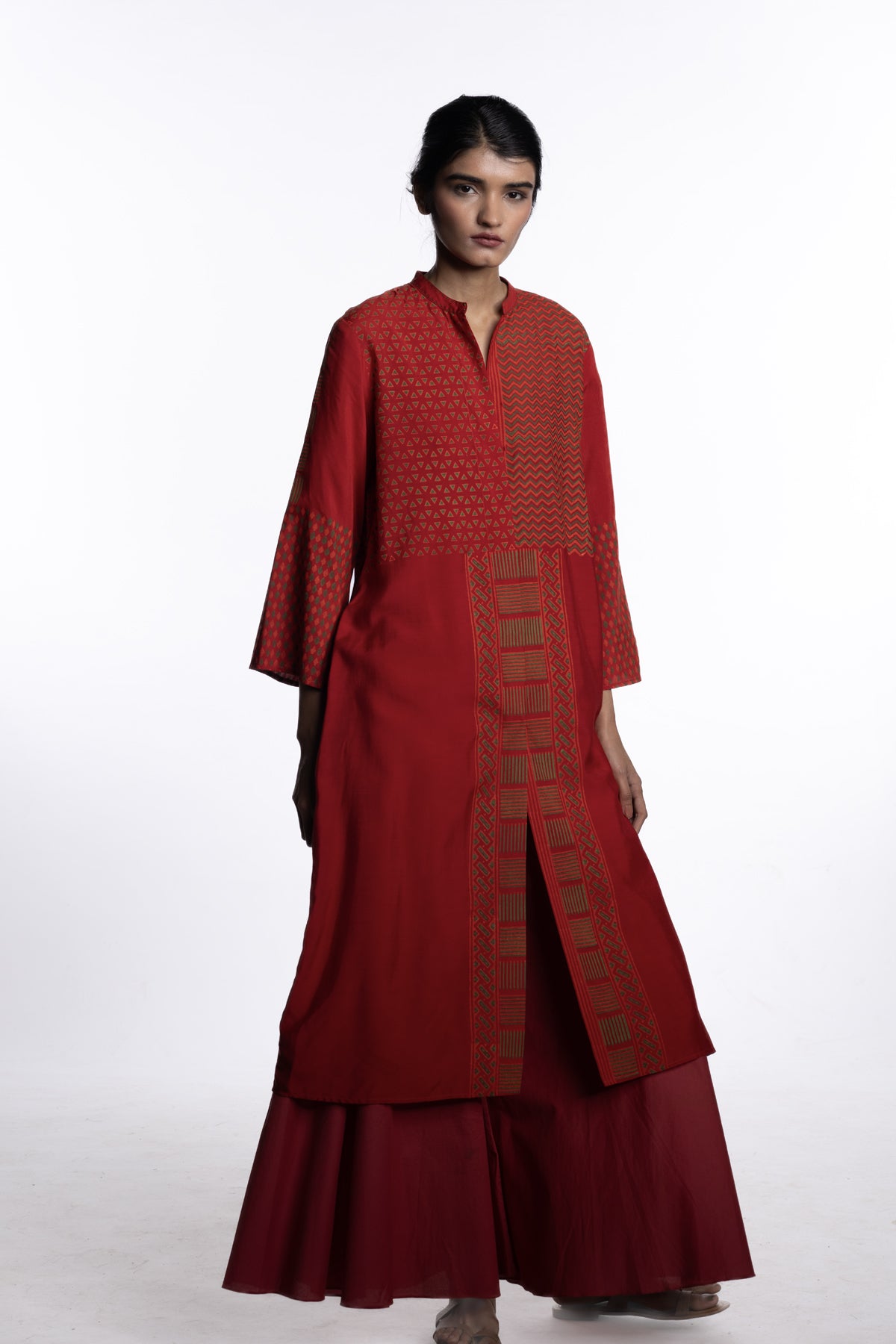 A front-open block printed tunic in red