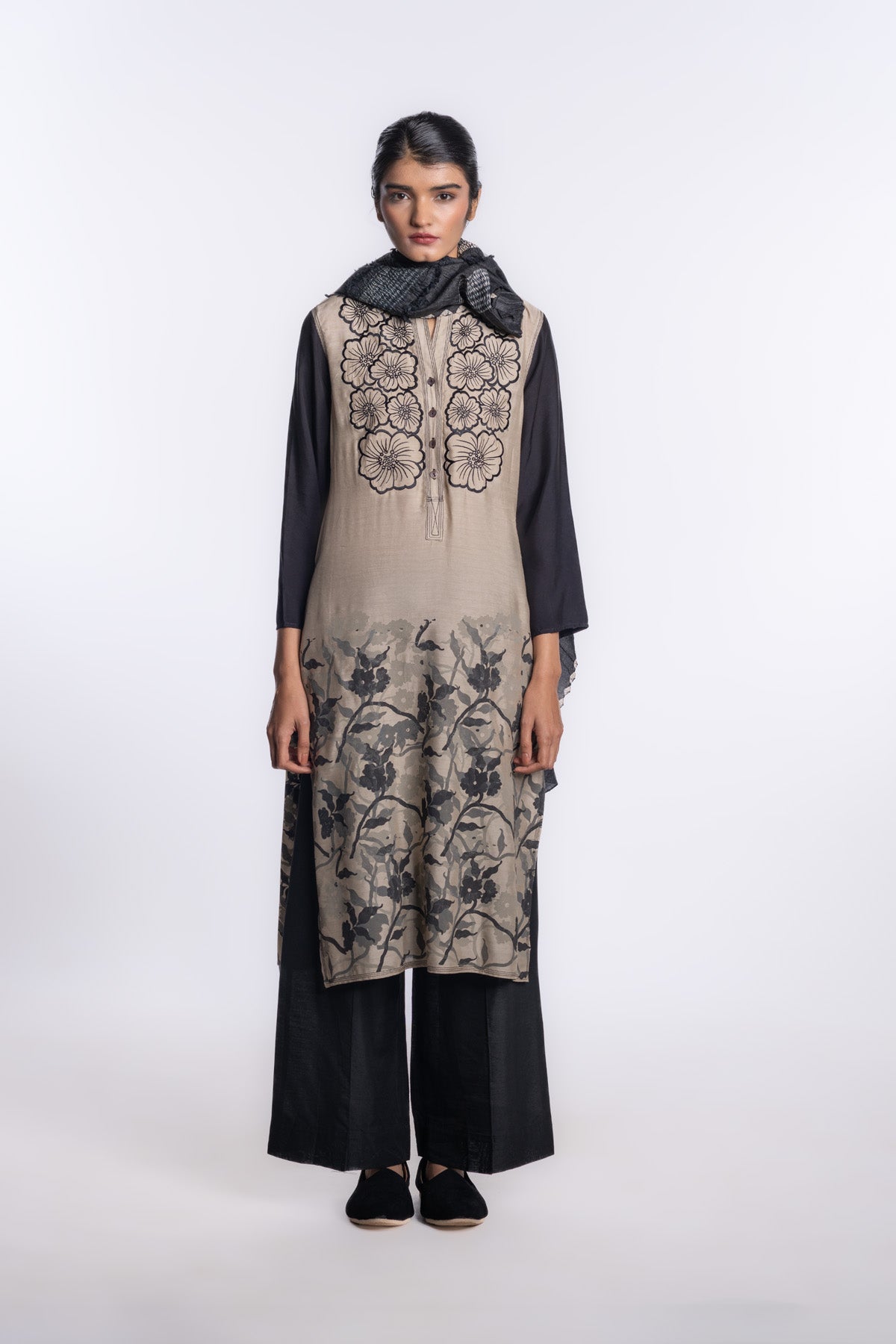 Soft beige hand-printed tunic with striking black sleeves